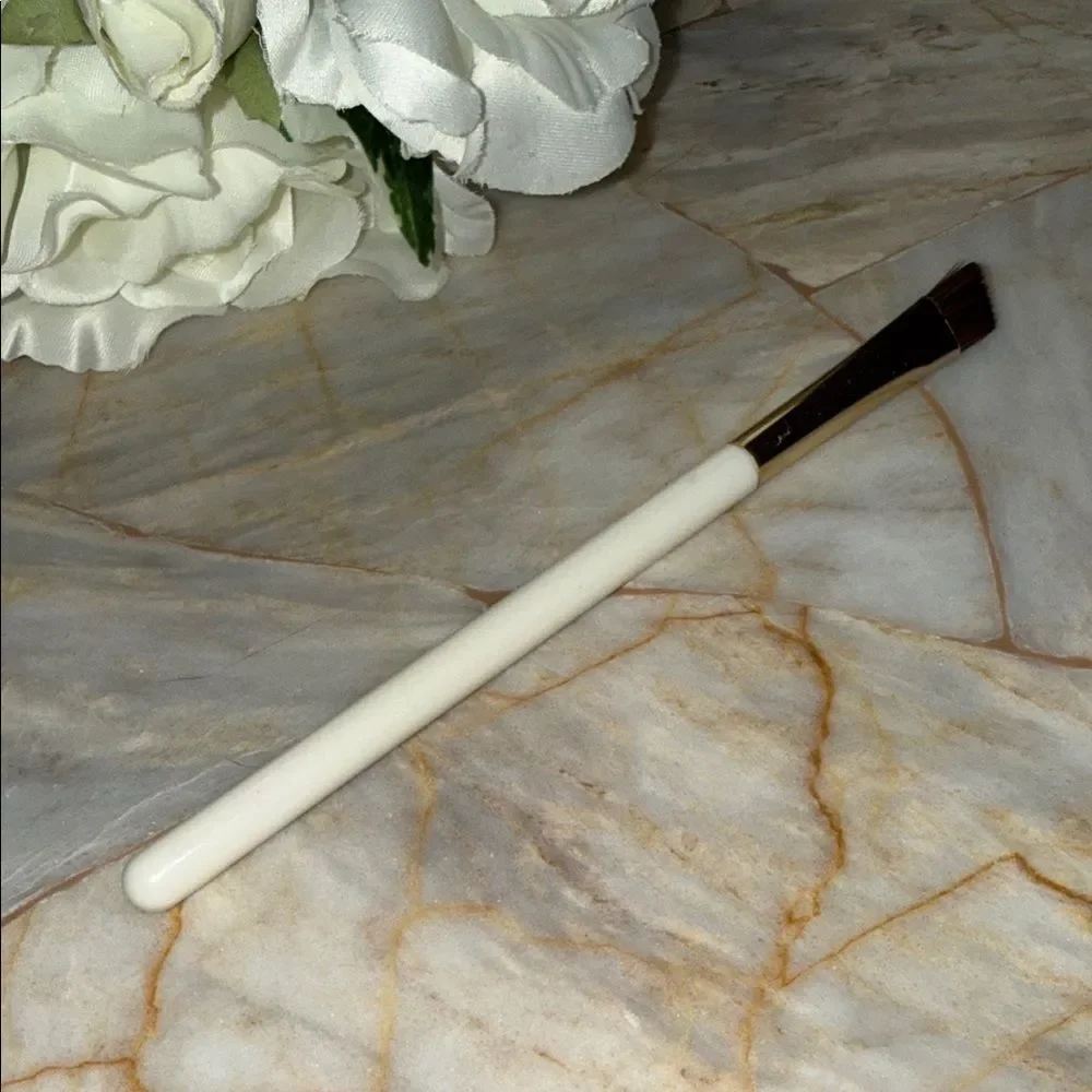 White Makeup Brush with Gold Accent